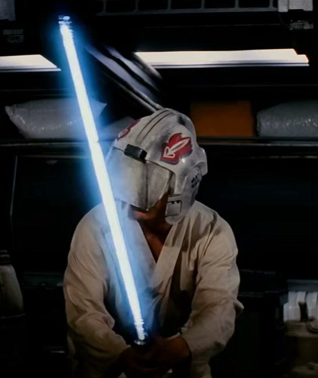 Luke blocks blaster bolts with his eyes covered